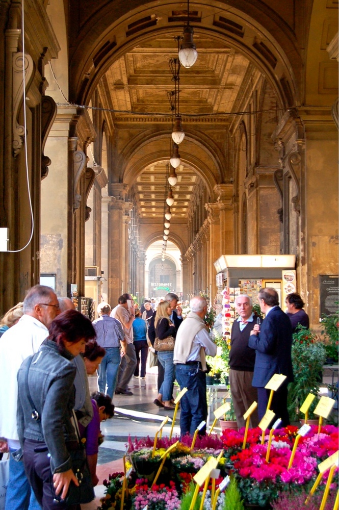 The Flower market in the arcade along Via Pellicceria